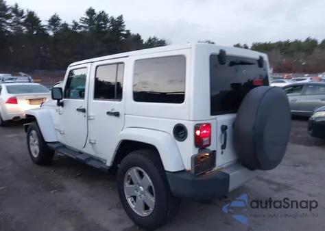 2011 Jeep Wrangler Unlimited Sahara из США, поврежденный, VIN 1J4HA5H14BL538867